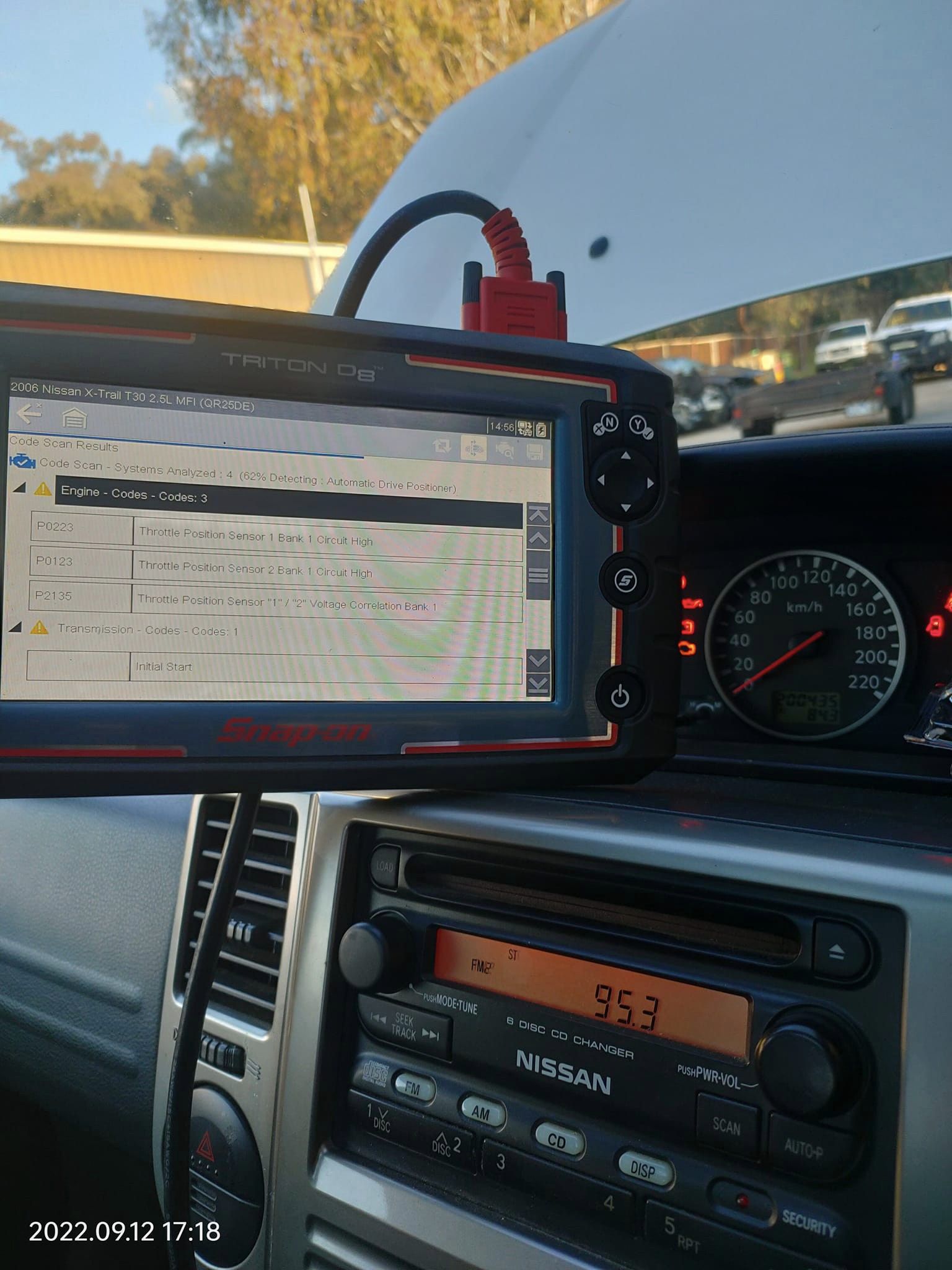 The scan tool set up on the dash of a Nissan X-Trail on an on site job